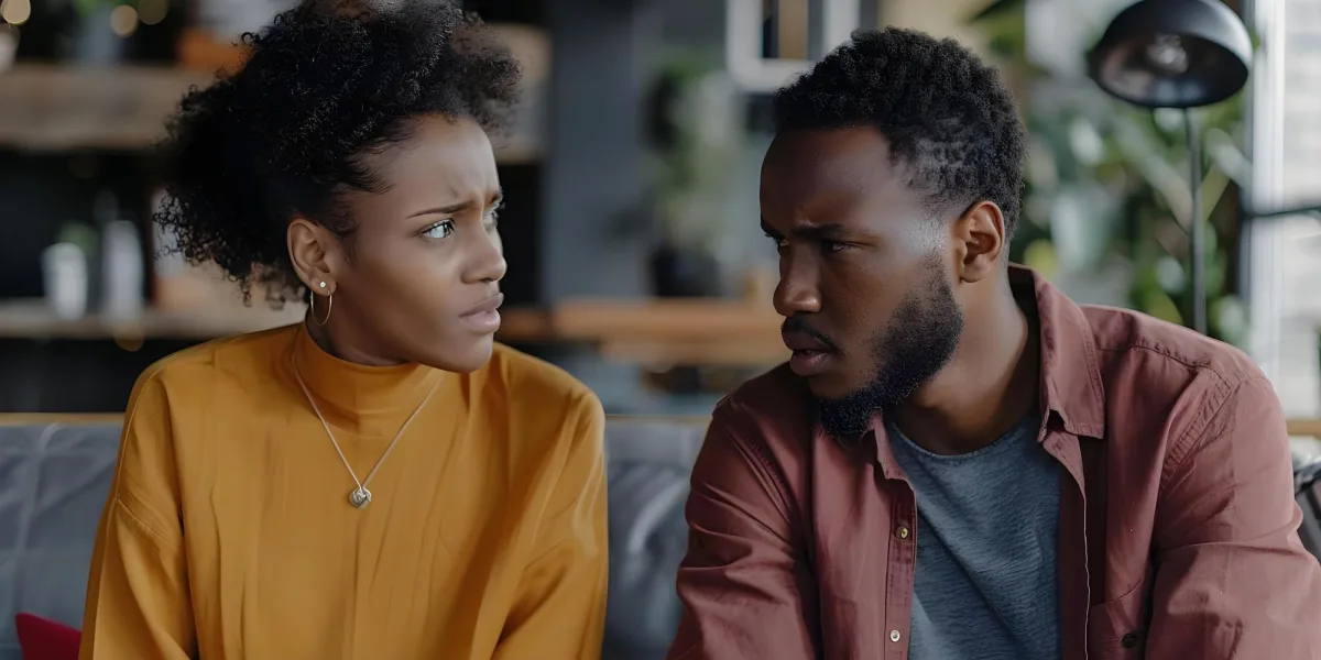 emotional intelligence in conversation — Black couple processing emotions of breakup in serious conversation acknowledging feelings Concept Relationship Dynamics Emotional Communication Breaking up Confronting Emotions