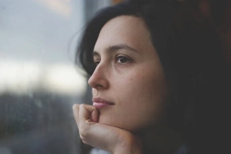 Women staring out of the window