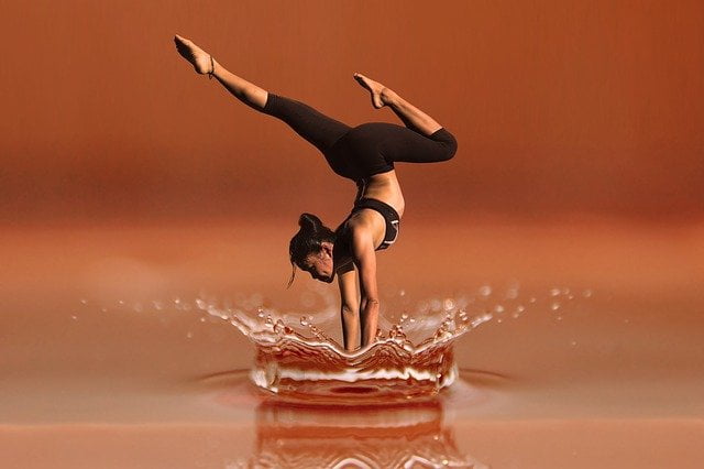 asian women dancing in the water splash