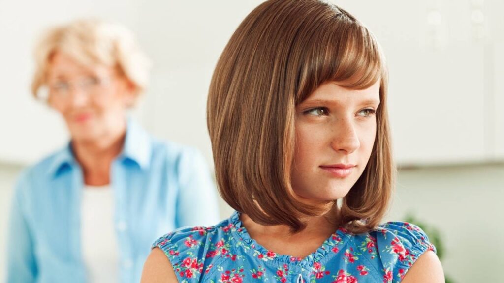 Generation gap shown - Young lady and elderly woman