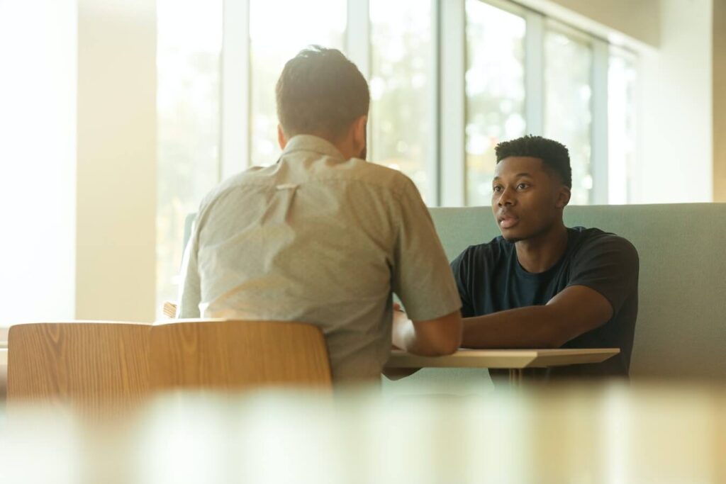 two-men-talking-how-to-answer-awkward-questions